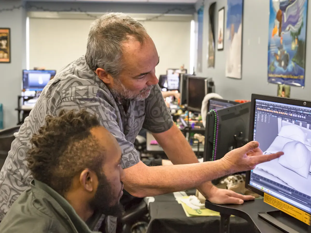 Student receiving practical guidance from a mentor
